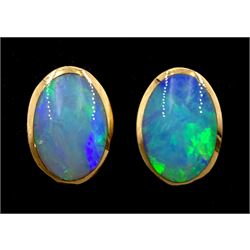 Pair of 9ct gold oval opal stud earrings, stamped 375