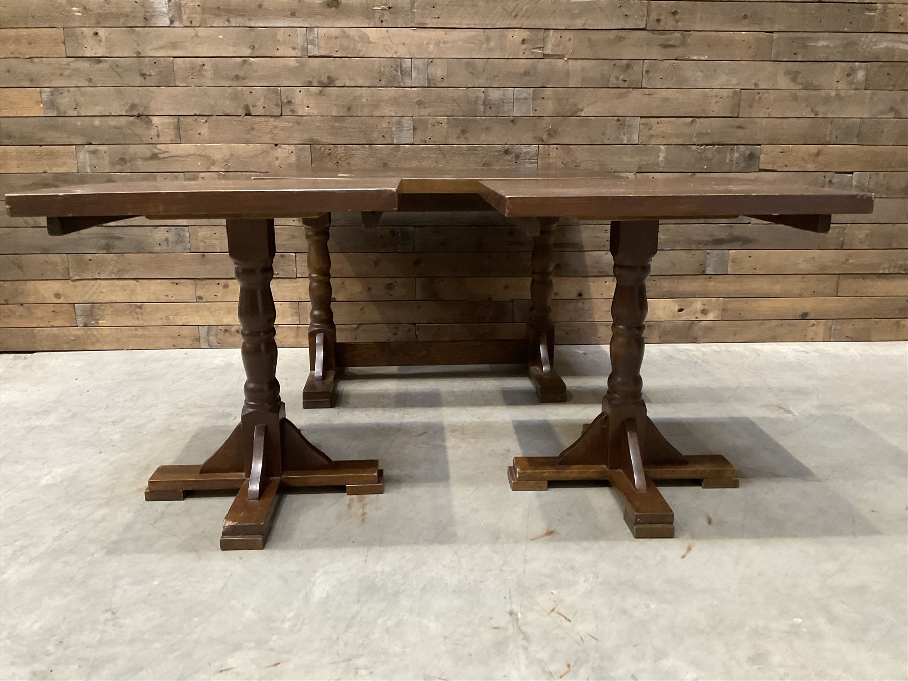Single oak rectangular table on turned supports joined by a single stretcher (W110cm, D80cm, H75cm) and two similar square pedestal tables (W70cm, D70cm, H76cm) (3)