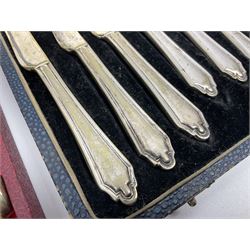 Set of six stag horn handled knives by Cooper Brothers and Sons, together with a set of silver plated dessert knives and forks for six place settings, both within fitted cases