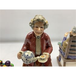 Four Royal Doulton figures, comprising Teatime HN2255, Eventide HN2814, A Stitch in Time HN2352 and small The Old Balloon Seller HN2129, all with printed marks beneath