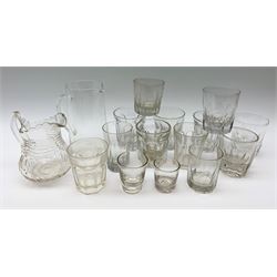 A group of 19th century moulded and slice cut glass tumblers, together with two later glass jugs. 