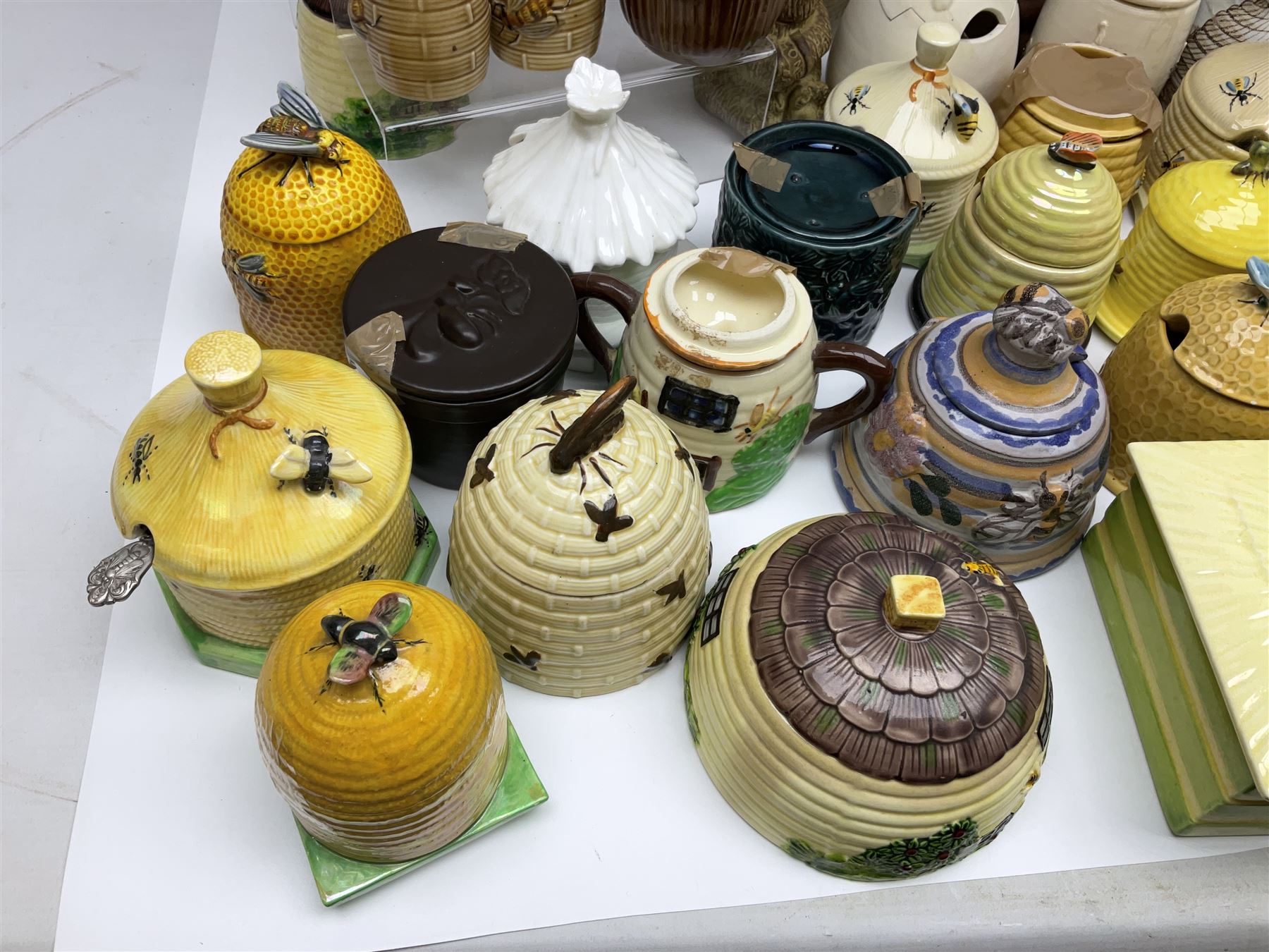 Large collection of honey pots, of various shapes, to include examples from Crown Devon, Marutomo ware, W.H Gloss, Goebel etc 