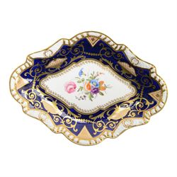 Collection of 19th century porcelain dessert wares, comprising Bloor Derby dish, circa 1825, Spode Felspar shaped oval dish, circa 1820, Ridgeway shaped oval footed dish with twin handles, circa 1840, Ridgeway dish, circa 1820, and tazza and dish, probably Minton, pattern 4810, each decorated in various patterns with floral sprays against dark blue grounds and heightened with gilt