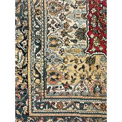 Persian design rug, rectangular crimson ground field with medallion, surrounded by trailing foliate branches, within wide border bands decorated with stylised floral motifs 