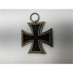 WW2 German 1939 Iron Cross 2nd Class by S. Jablonski G.m.b.H. Posen, ribbon ring stamped '128'; and sinking of the SS Lusitania, 1915, an English cast copy of the medal by K. Goetz, liner sinking, legend and date 5 may 1915 in exergue, rev. passengers buying tickets from a skeleton at the Cunard booth (2)