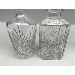 Silver collared cut glass vases, hallmarked Henry Williamson Ltd, and two clear glass decanters, tallest H28cm
