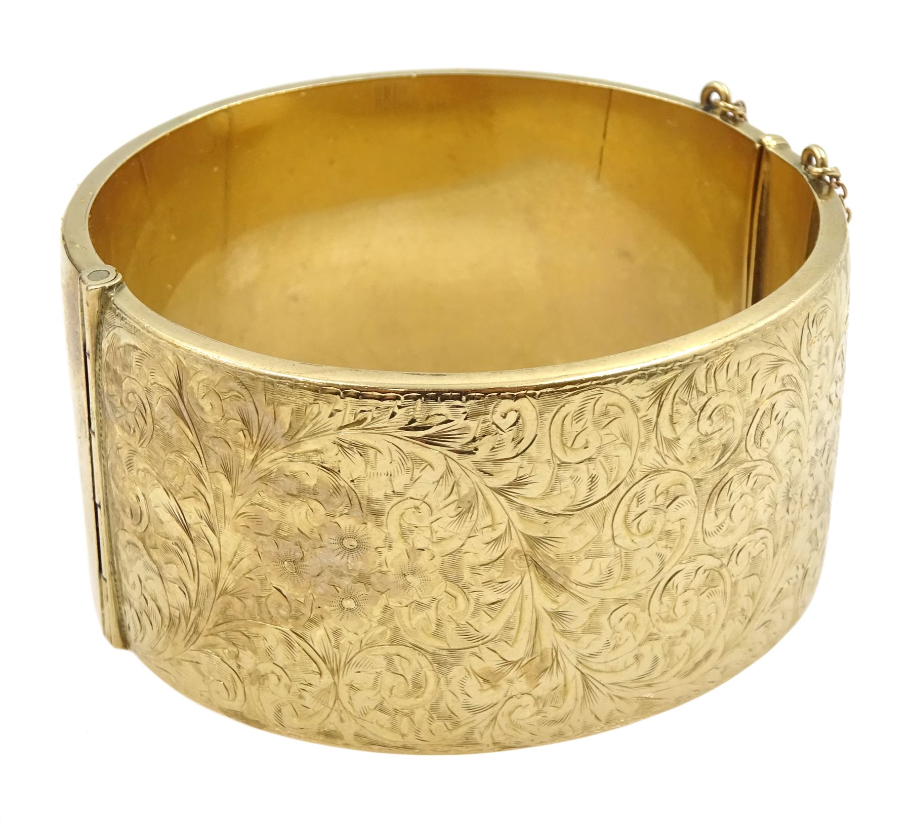 9ct gold wide hinged bangle, with bright cut foliate decoration, by Smith & Pepper Ltd, Birmingham 1963, boxed