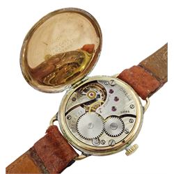 Omega 1930's gold-plated gentleman's manual wind wristwatch, No.8665002, white enamel dial with Arabic numerals and subsidiary seconds dial, case by Dennison, on brown leather strap