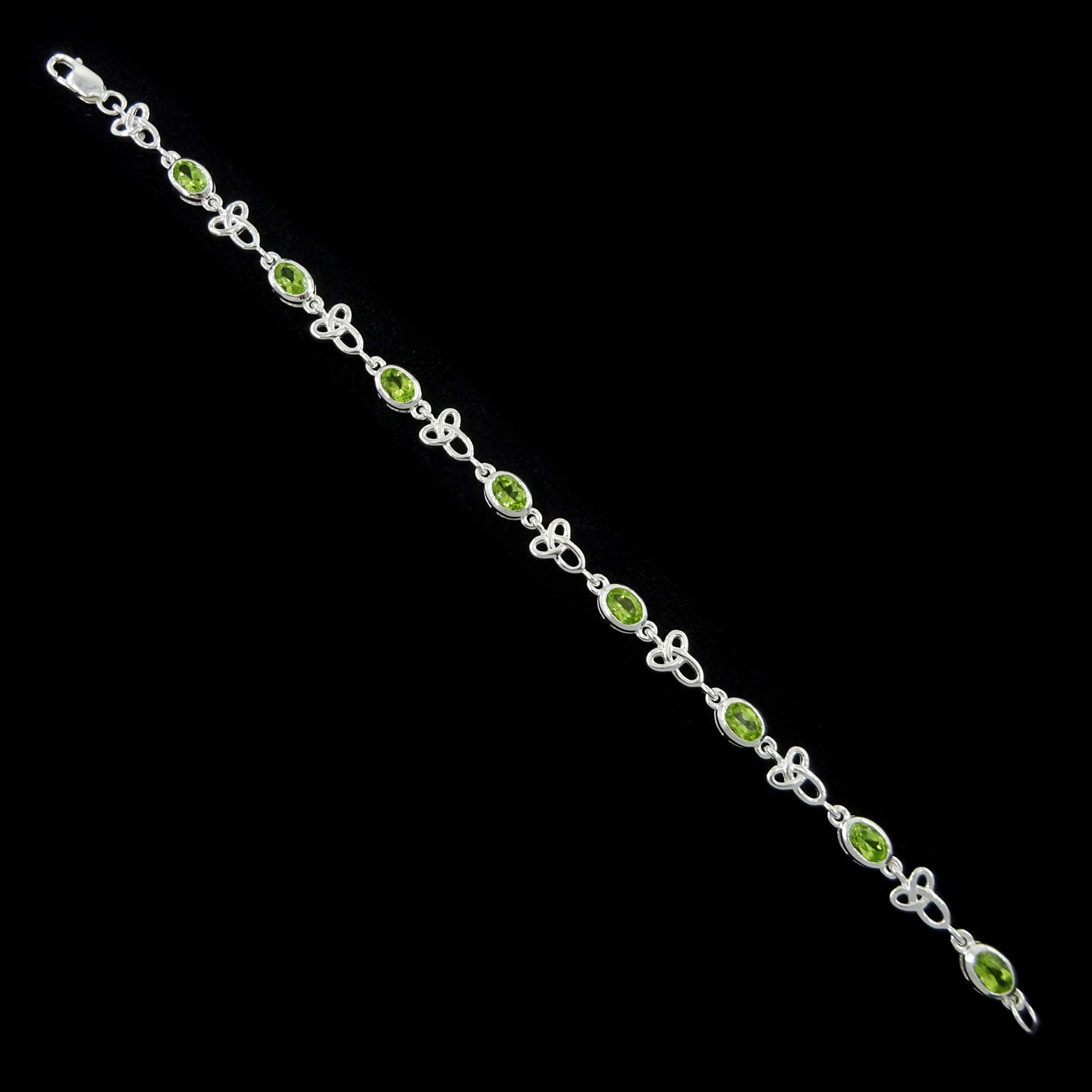 Silver peridot and Celtic design link bracelet, stamped 925
