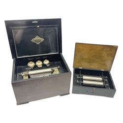 Swiss - 19th-century cylinder music box with three butterfly bells in sight, in a mahogany case with two separately boxed  6” cylinders, glazed viewing lid, 41 tooth comb (one tooth broken) crank key missing, movement untested.