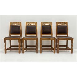 'Lizardman' set six dining chairs, two carvers and four side chairs, carved and pierced lattice top rail over cushioned back and drop in seat upholstered in brown leather, by Derek Slater of Crayke