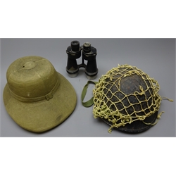  WW2 Mk lll tin Helmet, black painted with adjustable liner and net cover, and a Tropical Helmet by B.C.Nawn & Bros, Ltd, 1939, size 7 and a pair of Binoprism No.5 Mk.ll x7 Binoculars stamped 1941 with Crows foot, in poor condition, (3)  