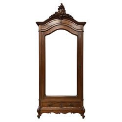 Mid-to late 20th century French walnut armoire wardrobe, shaped top with carved shell cartouche pediment with extending floral and foliate decoration, enclosed by bevel glazed door, fitted with single drawer, shaped scroll carved apron on shell carved cabriole feet with scrolled terminals, with four adjustable shelves