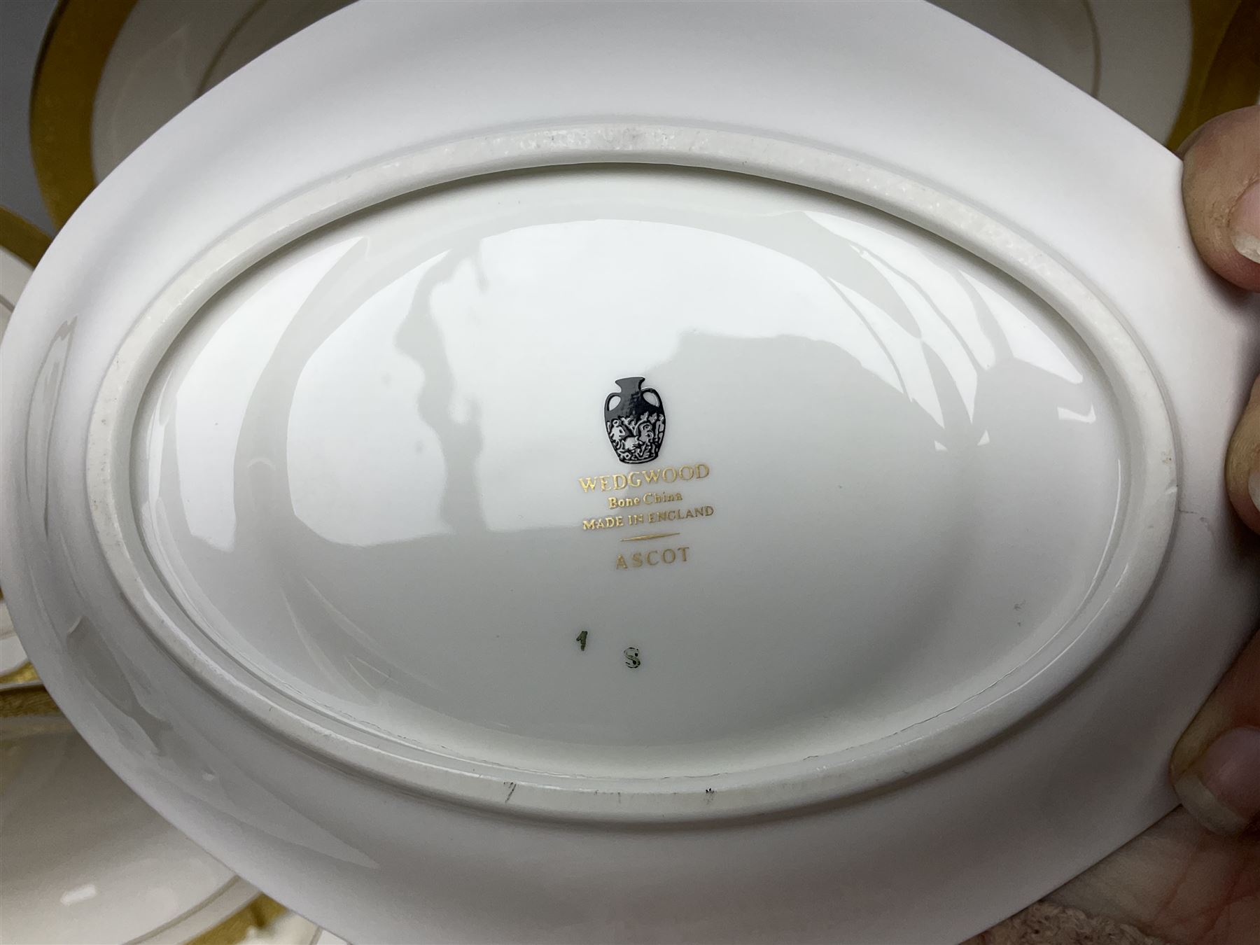 Wedgwood Ascot pattern part tea and dinner service, comprising eleven dinner plates, ten small dinner plates, nine bowls, eight dessert plates, seven saucers, nine tea cups, sauce boat and stand, milk jug, two twin handled soup bowls, serving dish and meat platter (60)