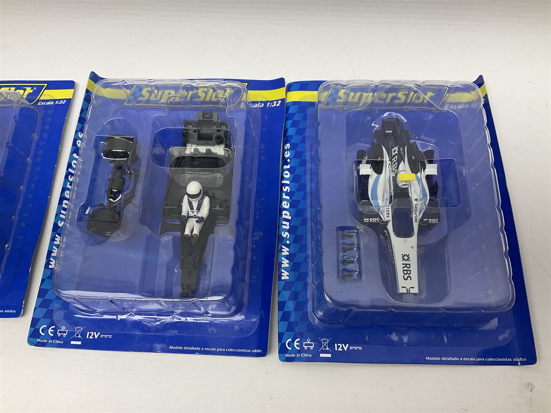 Scalextric - Scalextric 400 C587 set with March Ford 721 and JPS Formula One cars; Calibra Cup set with Motorsport Calibra and Old Spice Calibra; C8040 Track Extension Pack, Hump Back Bridge part-set and unassociated SuperSlot 1:32 scale die-cast Williams-Toyota FW29 unassembled car in four blister packs 