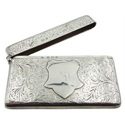 Edwardian silver card case, of rounded rectangular form with vacant cartouche to front and engraved scrolling foliate decoration to the whole, hallmarked Birmingham 1907, makers mark B.C, W8.5cm, approximate weight 1.91 ozt (59.6 grams)