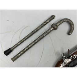 Reproduction non-firing flintlock pistol with brass skull crusher butt, the lock-plate inscribed 'Tower' and 'GR' L40cm; Sabre Japan Original Bowie Knife in sheath; and Indian embossed nickel two-piece walking cane (3)