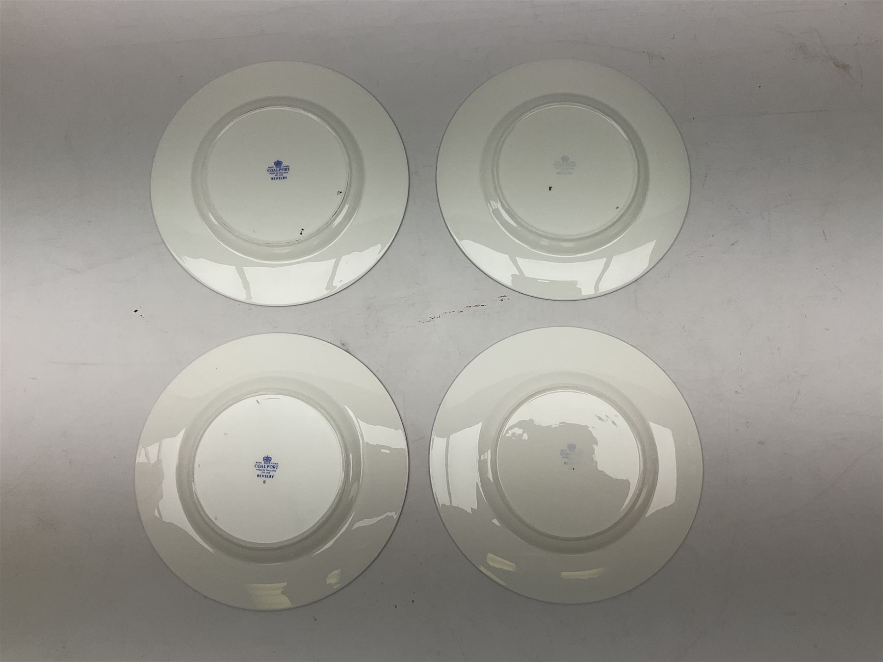 Coalport Revelry pattern tea and dinner wares, comprising nine dinner plates, four salad plates, eleven side plates, sauce boat and stand, ten teacups and ten saucers, and preserve pot and cover, together with a Coalport plate of shaped form decorated with pink roses, and a Royal Crown Derby Royal Antoinette pattern trio