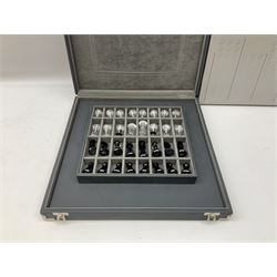 Swarovski silver crystal cut glass chess set, with clear and black pieces on mirrored board, in original presentation box 