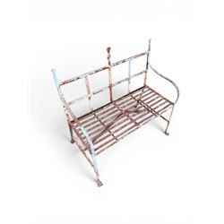 Regency period wrought iron strapwork garden bench, cresting rail with central Scottish thistle motif and flanking pediments, in distressed blue painted finish