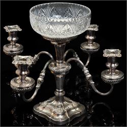 Silver plated four branch centrepiece set with glass bowls and a larger centre bowl and with interchangeable candle sconces H37cm  and a plated punch bowl with lion mask handles D37cm (2)