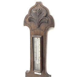 Early 20th century oak barometer, shaped pediment with foliage carved mount, mercury thermometer and aneroid barometer, H82cm