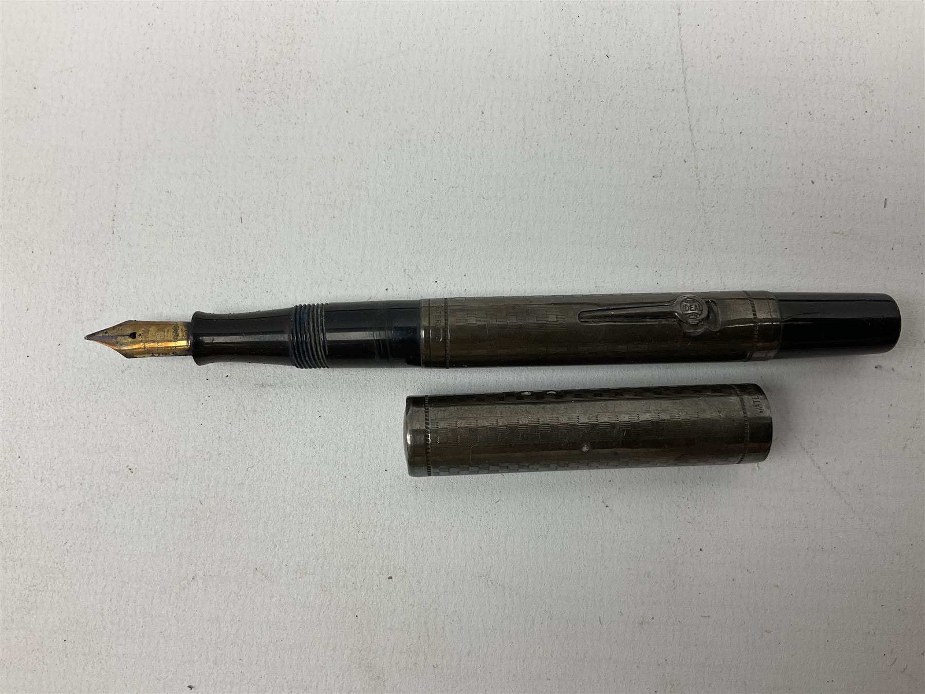  Silver Waterman's Ideal fountain pen with textured decoration, stamped Sterling, together with other fountain pens with gold nibs to include 14ct gold examples, together with further pens to include ballpoint examples