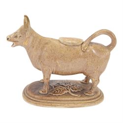 Collection of 19th century and later cow creamers, including three black glaze examples, two mottled brown examples etc  