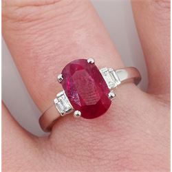 18ct gold oval ruby and baguette diamond ring, stamped 750, ruby approx 2.25 carat