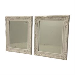 Pair of small wall mirrors in classical white swept frame, bevelled plate