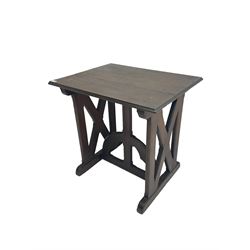 Arts and Crafts oak side table, rectangular top with moulded edge, raised on chamfered X-frame end supports united by demi-lune stretcher with gothic arch design 