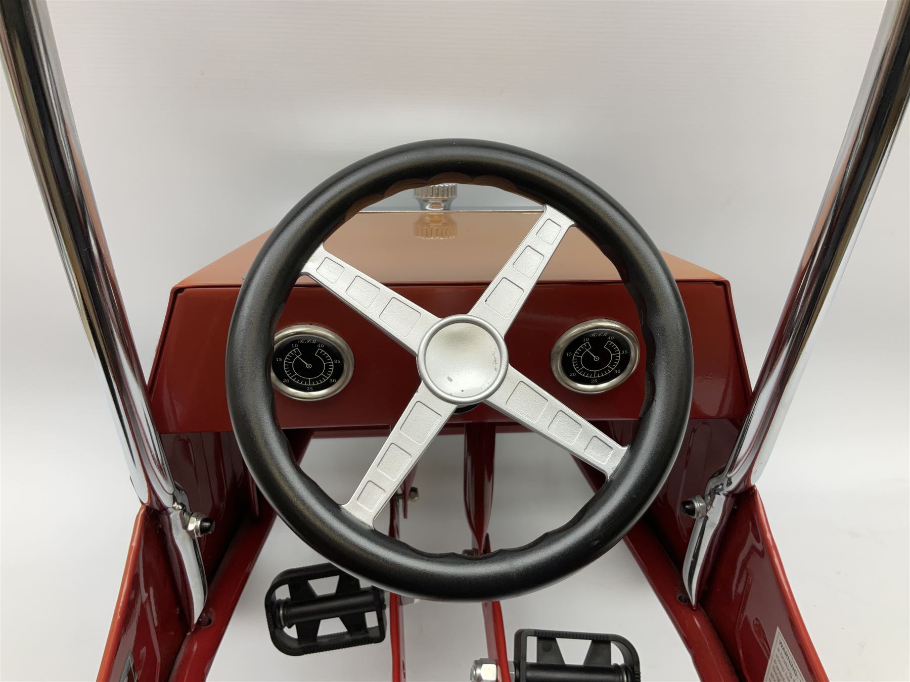 Red child's tin-plate pedal car with chrome detail, by Posh Paddles, Scarborough, H56cm, L80cm