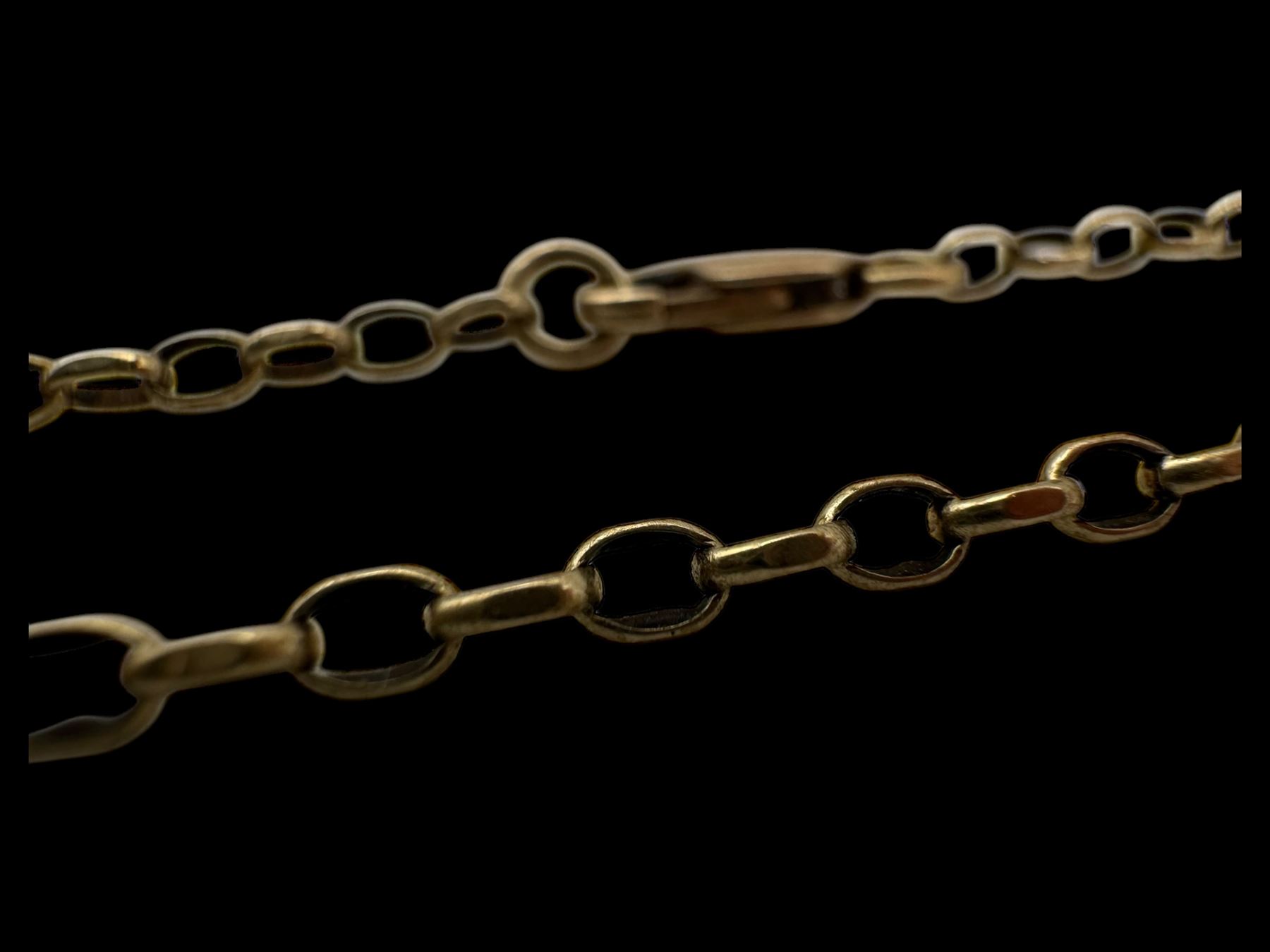 22ct gold thin wedding band, two 9ct gold onyx signet ring and a 9ct gold chain, all hallmarked