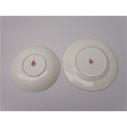 19th century Minton tea set, comprising twelve teacups, eleven saucers, fifteen side plates, cream jug, slop bowl, and two cake plates, decorated with panels of floral sprays, upon a green ground, heightened with gilt throughout, with printed puce mark beneath, and pattern number 5329
