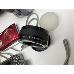 Nikon Coolpix 8700 camera body, serial no 3220838, with Zoom Nikkor Ed 8.9-71.2mm 1:2.8-4.2 lens, together with Canon digital video camcorder and other digital cameras and camera equipment