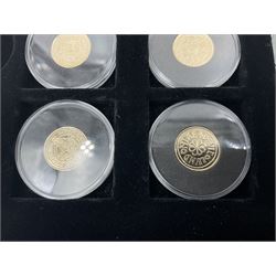 Sixteen hallmarked 9ct gold replica coins from 'The Historic Coins Of Great Britain Museum Gold Collection', housed in a Westminster display case, overall weight approximately 51.3 grams