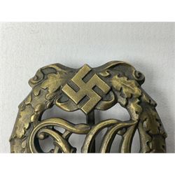 Two WW2 German Sports badges - SA sports badge marked verso 'W.Redo Eigentum D. Obersten SA. Fuhrung Saar Lautern'; and DRL sports badge marked verso 'Wernstein Jena D.R.G.M. 35269' (2)