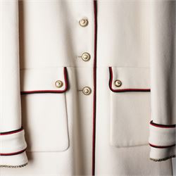 Gucci - bee embroidered wool single-breasted military coat, from the Autumn/Winter 2017 collection under Alessandro Michele, in ivory, with stand collar, red and navy trim, pearlescent and gold-tone button fastening and embroidered bee detailing to the collar, size 14, unused with original garment bag and tags