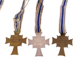 WWII German Third Reich three Mothers Cross, in gold, silver and bronze 
