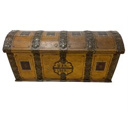 19th century painted oak sea chest, hinged dome top enclosing small compartment, bound by shaped and pressed metal strapwork, scumbled finish to resemble oak and painted with small vignettes depicting portraits and landscapes within panels, fitted with large wrought metal carrying handles, the front inscribed 'H.J.S. 1870' 