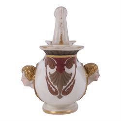 Royal Worcester double-ended vase, modelled in relief with mask panels in the classical dress the central handle with foliate and scroll work, H16cm 
