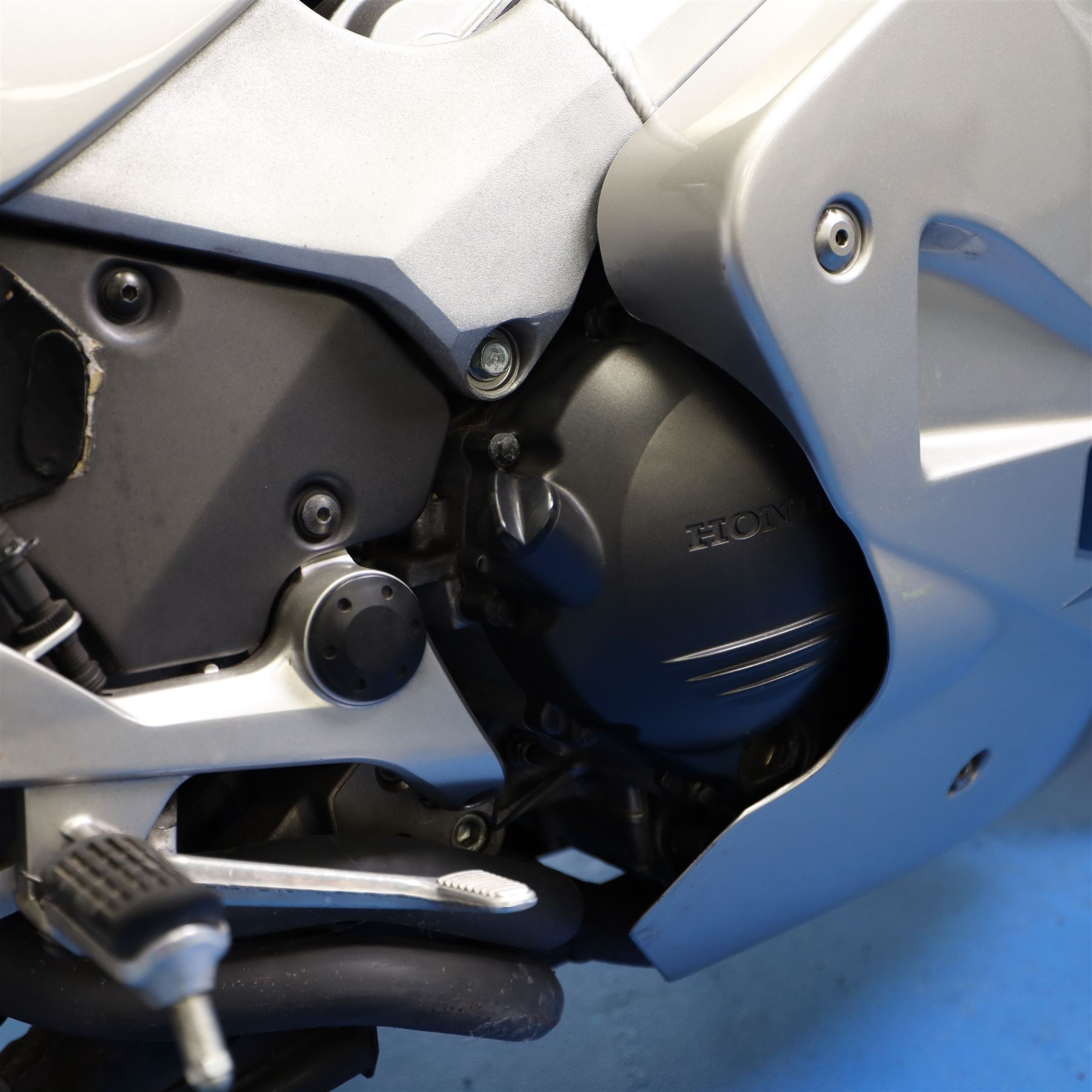 1998 Honda VFR800 FI Sports Touring Motorcycle

• Registration: R145 SUT
• Date of first registration: 1998
• Engine: 781cc V4 petrol
• Fuel system: Honda PGM-FI fuel injection
• Transmission: Manual
• Odometer reading: 11,700 miles
• Colour: Silver with black trim
• V5C: Present
• Keys: Two
• Security: Datatag immobiliser

A well-presented 1998 Honda VFR800 FI sports touring motorcycle, finished in silver with contrasting black trim and displaying a notably low odometer reading of 11,700 miles.

The VFR800 combines Honda’s renowned V4 engine with PGM-FI fuel injection and a combined braking system, creating a capable and refined motorcycle suited to both sporting and long-distance use.

Features include:

• Full factory fairing
• Tinted windscreen
• Honda PGM-FI fuel injection
• Combined braking system
• Twin front brake discs
• Factory exhaust system
• Alloy wheels
• Rear passenger grab handles
• Datatag immobiliser
• Digital instrument display

The motorcycle appears complete and largely original and has been stored indoors. It is presented in good overall condition, with light cosmetic marks consistent with its age and use.

This vehicle forms part of the Estate of the Late John Sils and is offered for sale by the Executors, confirming a genuine reason for sale.

