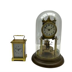 An unmarked late 19th century 400-day torsion clock under a glass dome, with a solid rotary pendulum, cream dial with Arabic numerals and steel spade hands with a beaded bezel mounted on a circular brass base with two pillars.
With a 20th century French three glass Bayard carriage clock, 8-day movement with a lever platform escapement wound and set from the rear with integral key, white painted dial with roman numerals and minute markers, steel spade hands.



