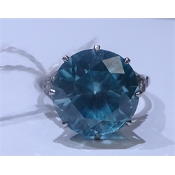  18ct white gold (tested) blue zircon ring, with diamond set shoulders  