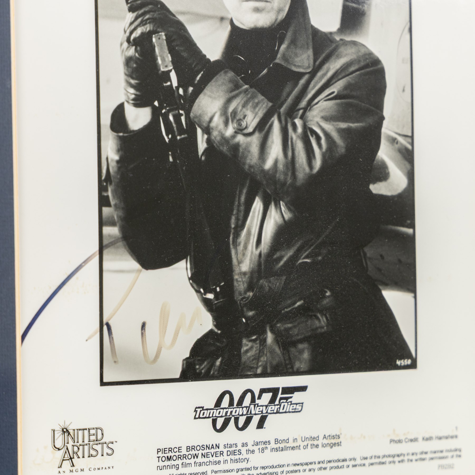 James Bond 40 years 20 films signed commemorative montage, comprising signed photographs of Sean Connery, George Lazenby, Roger Moore, Timothy Dalton and Pierce Brosnan, each with a certificate of authenticity from UACC Dealer Lester Freeman, framed, frame H79cm, W100cm