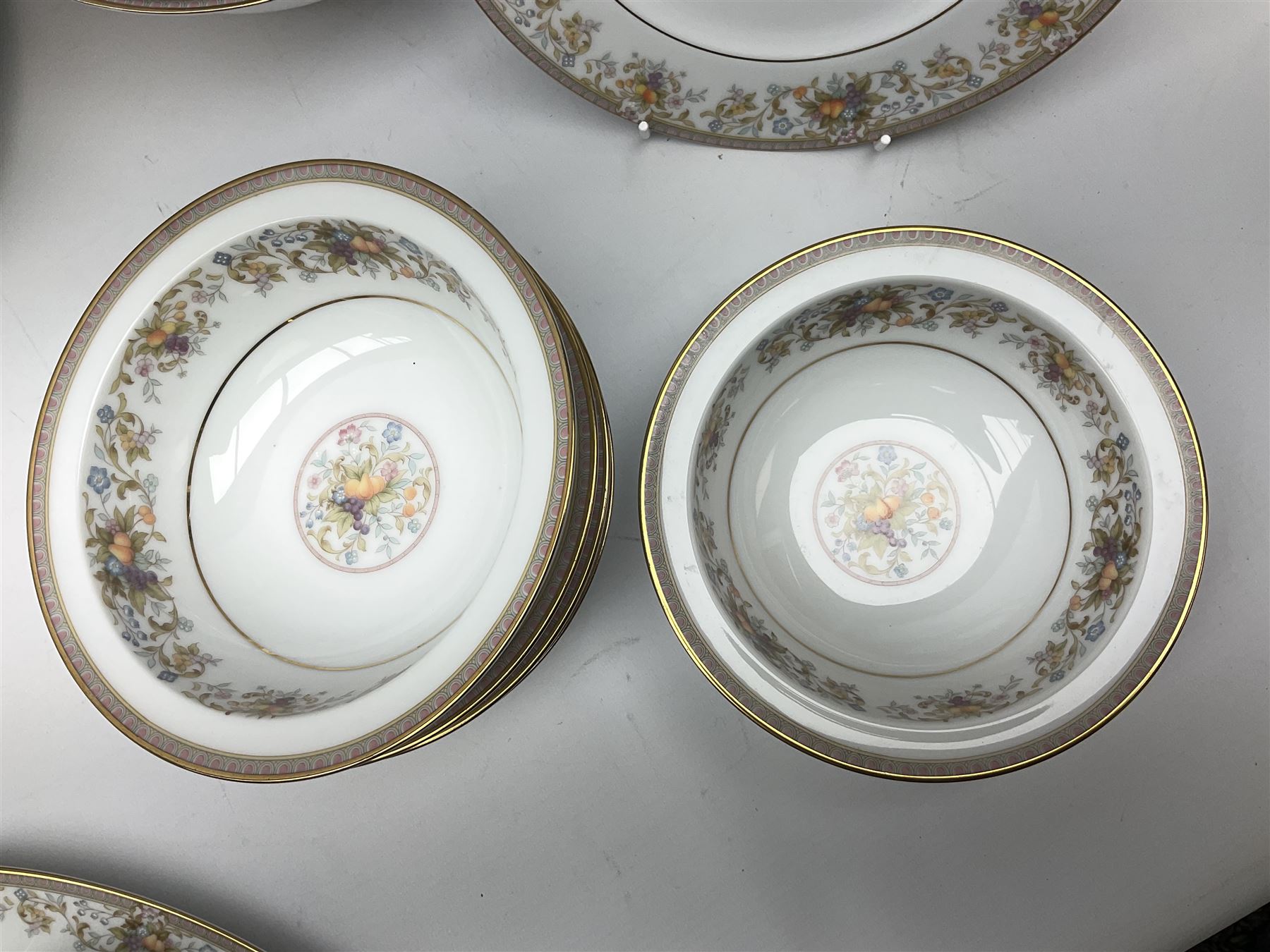 Noritake Ireland tea and dinner wears, comprising of teapot, milk jug, covered sucrier, seven teacups and saucers, seven dessert plates, six dinner plates, seven side plates, five bowls two serving dishes, one lidded tureen and a gravy boat and dish