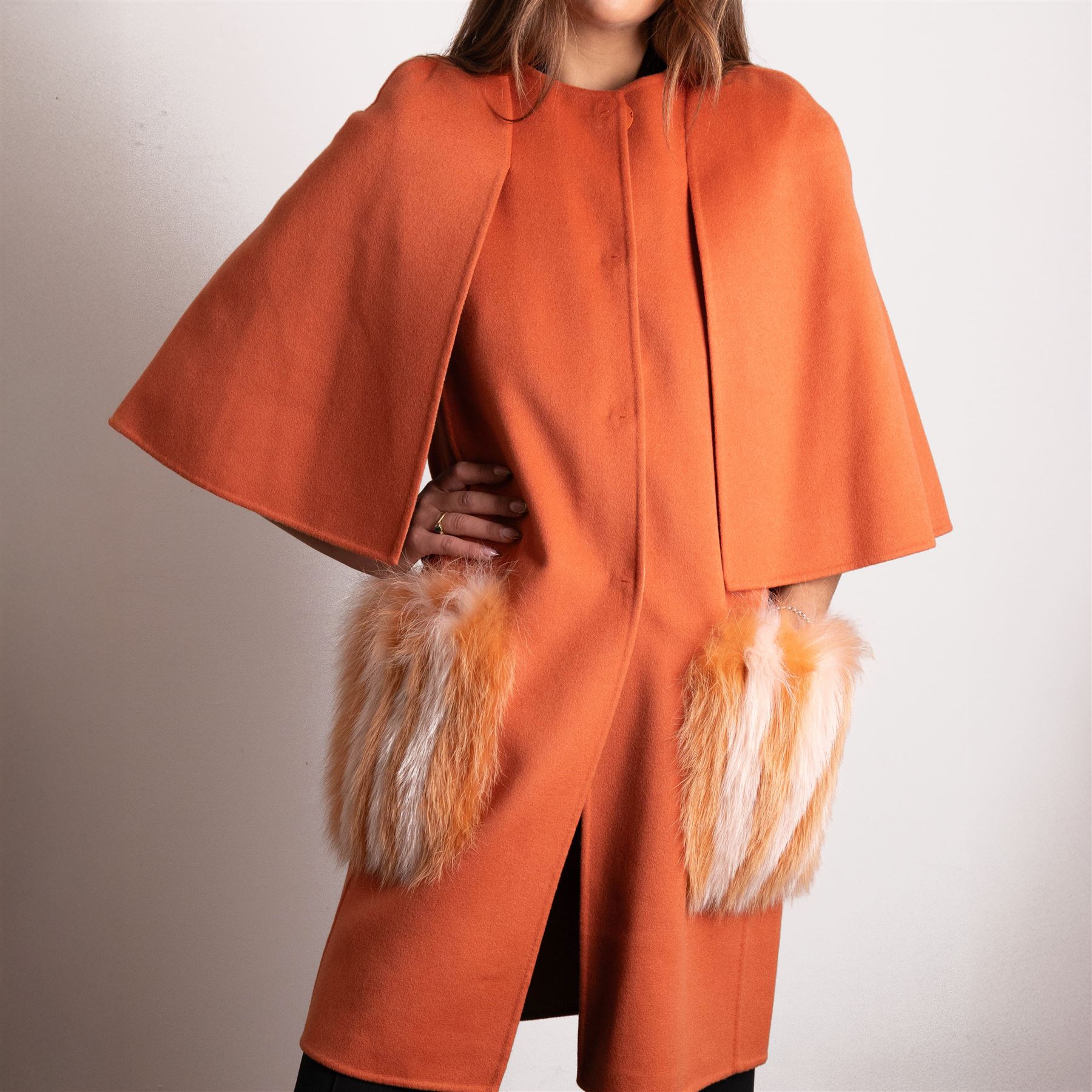 Fendi Roma - wool cape coat in 'Cayenne' orange peach, with concealed front fastening and short flared cape sleeves, applied with dyed arctic fox fur patch pockets, size 40, unused with original tags