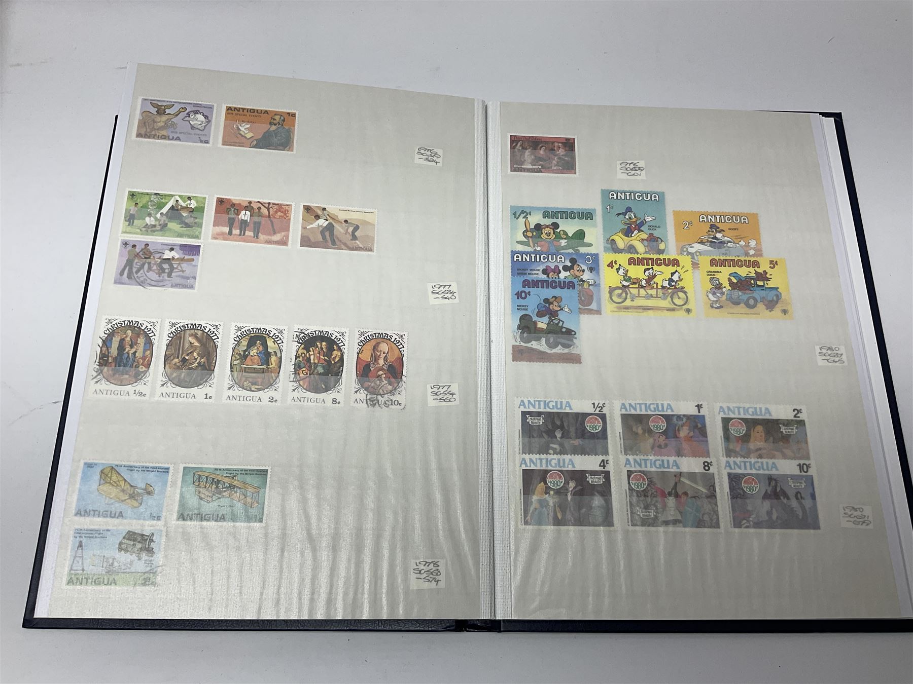 World stamps with many relating to Victory in Europe including King George VI '8th June 1946' stamps from various countries including Antigua, British Guiana, British Honduras, British Solomon Islands, Cayman Islands, Ceylon, Fiji, Grenada, Montserrat, St Helena etc, both mint and used stamps seen, housed in three stockbooks