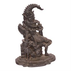 Victorian cast iron doorstop in the form of a rampant lion on a plinth base, together with cast iron Mr Punch doorstop, lion H39cm