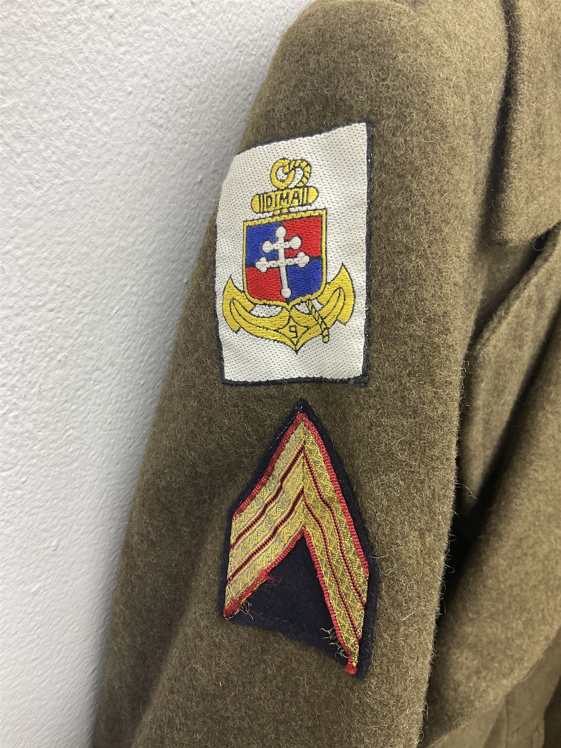 French Gendarmerie greatcoat, bears label for 'Maitre-Tailleur F.M. Barronnier 52 Chaumont 13 Rue Ferrer'; and French greatcoat (Indochine Period Vietnam 1947/1953)